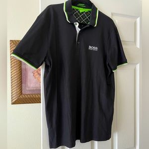 Hugo Boss polo shirt. Black with white and green accents on collar.